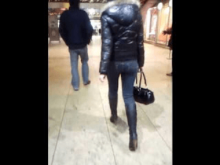 The Daily Press_ Gral Hueter_ Woman in Tight Denim Jeans- in Stiletto High Heel Boots